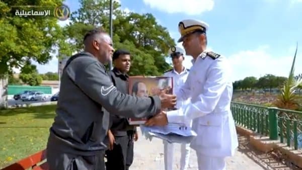 Police deliver aid on October anniversary