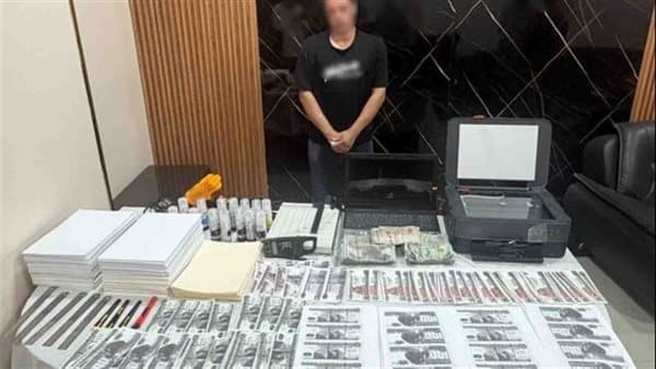 صاحب محل ببني سويف يروّج للعملات المزورة