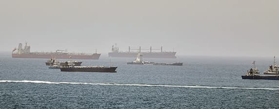 Tehran warns ships over route deviations