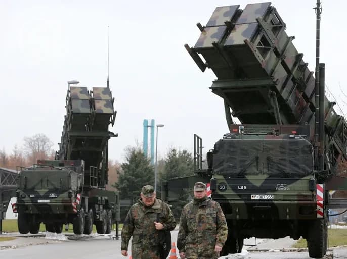 NATO activates air defenses after Iran threat