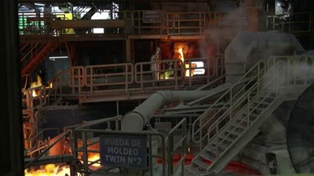 Chile mine mudslide traps two workers