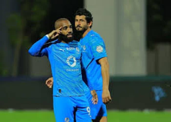 Lacazette Guides Neom to 4-2 Win