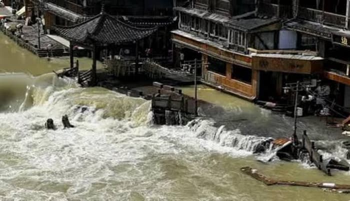 China evacuates 31,000+ amid rains