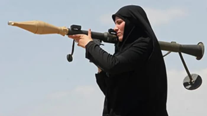 Iran enlists women to boost forces