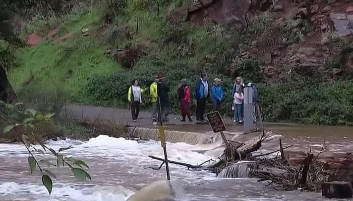 Arizona floods cut off 65 camps