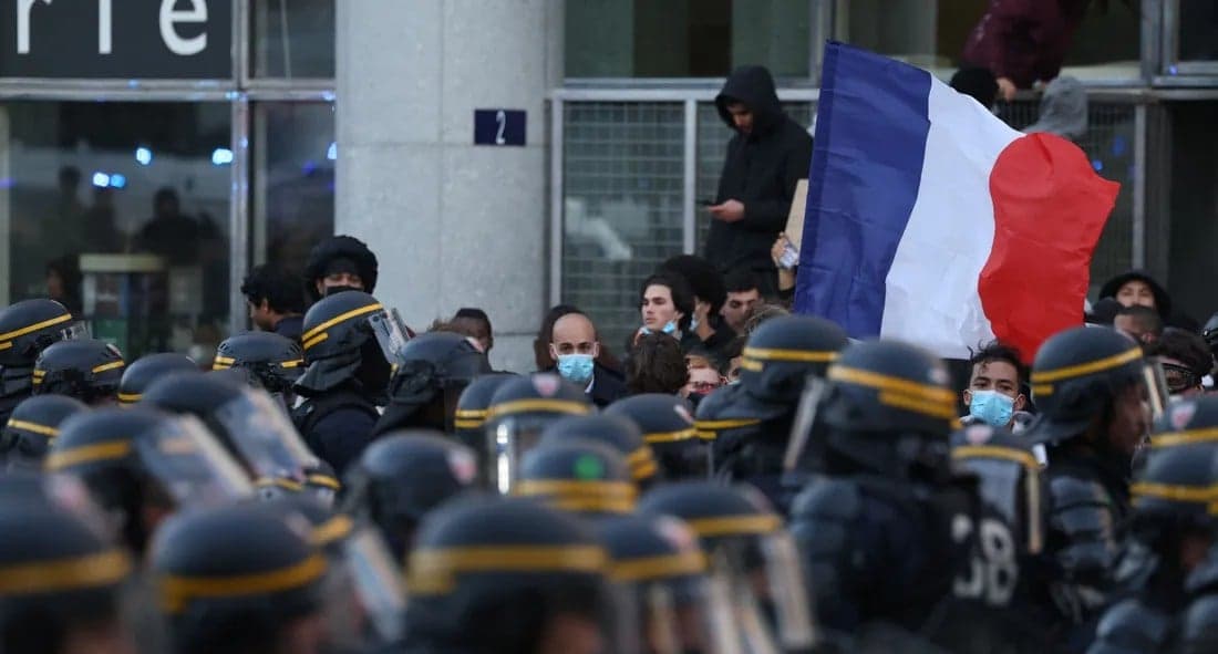 France protests: Macron upset over wife's sign