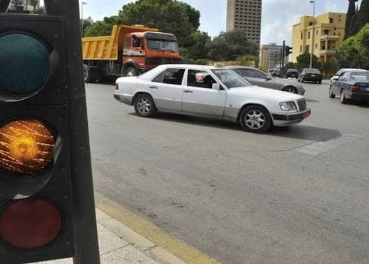 Security forces recording traffic signal violators
