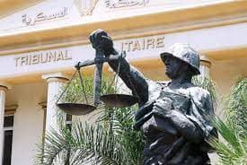 Military court charges 14 for Syria plot