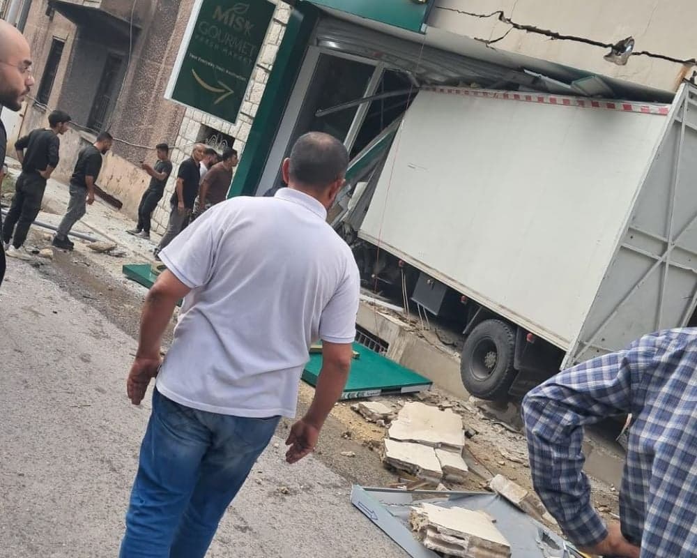 Truck damages shops and cars in Aley