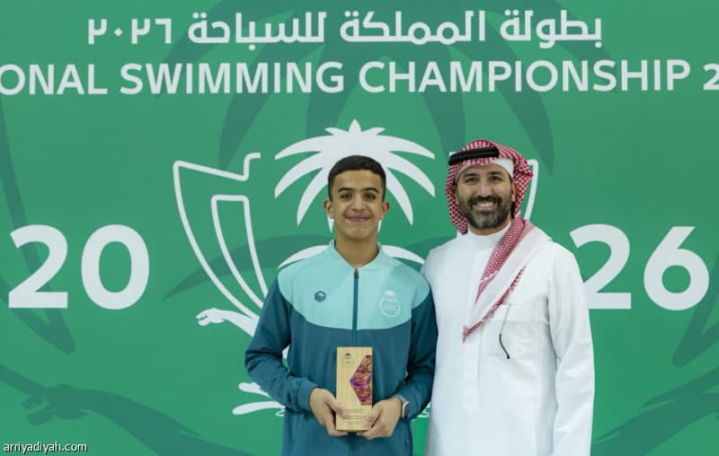 Swimming Federation celebrates record holder