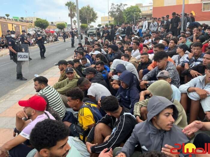 Rifle Disperses Ceuta Migrants