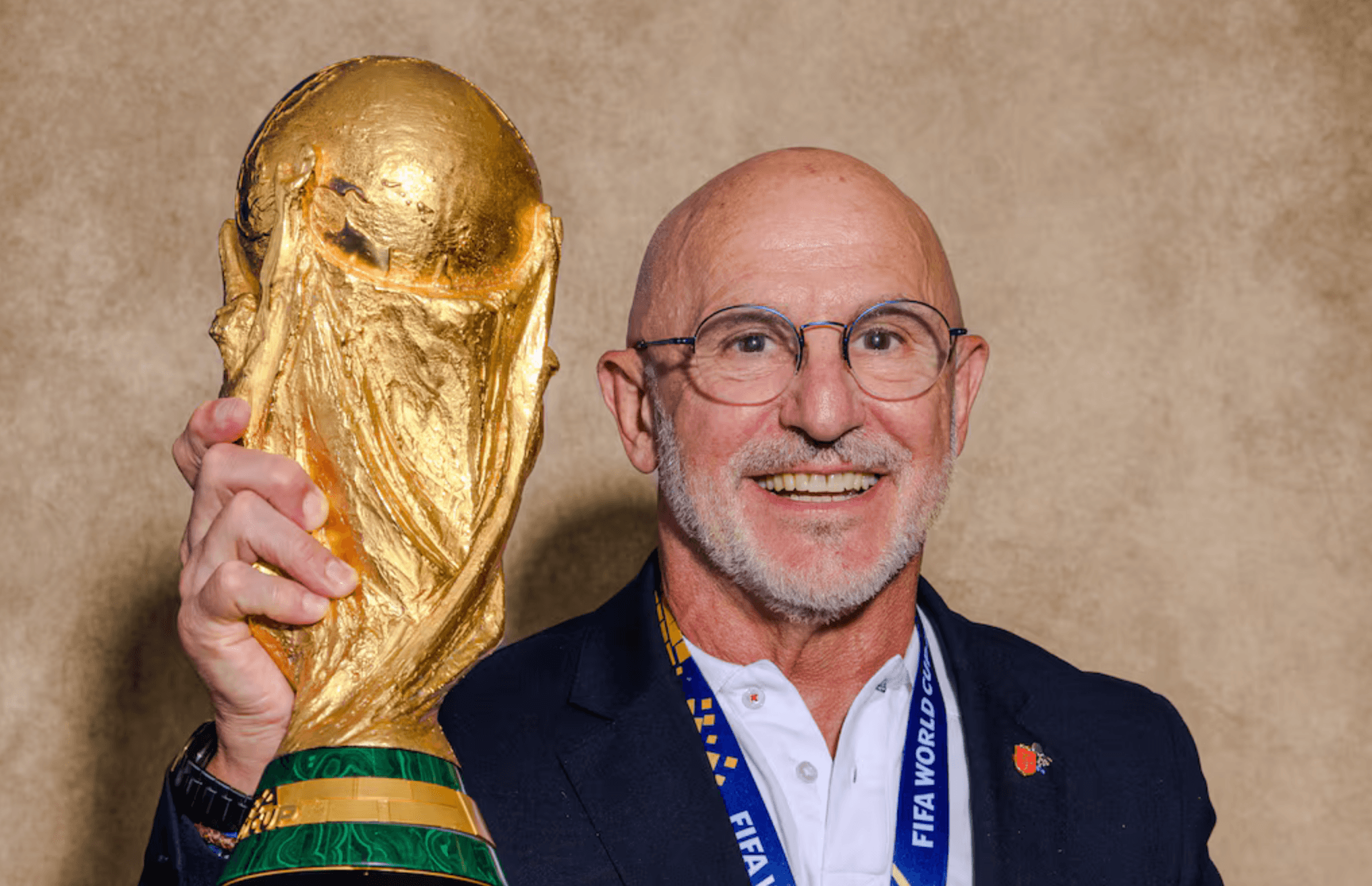 Spain coach wins World Cup on low salary