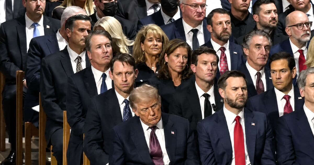 Trump causes stir at Graham's funeral