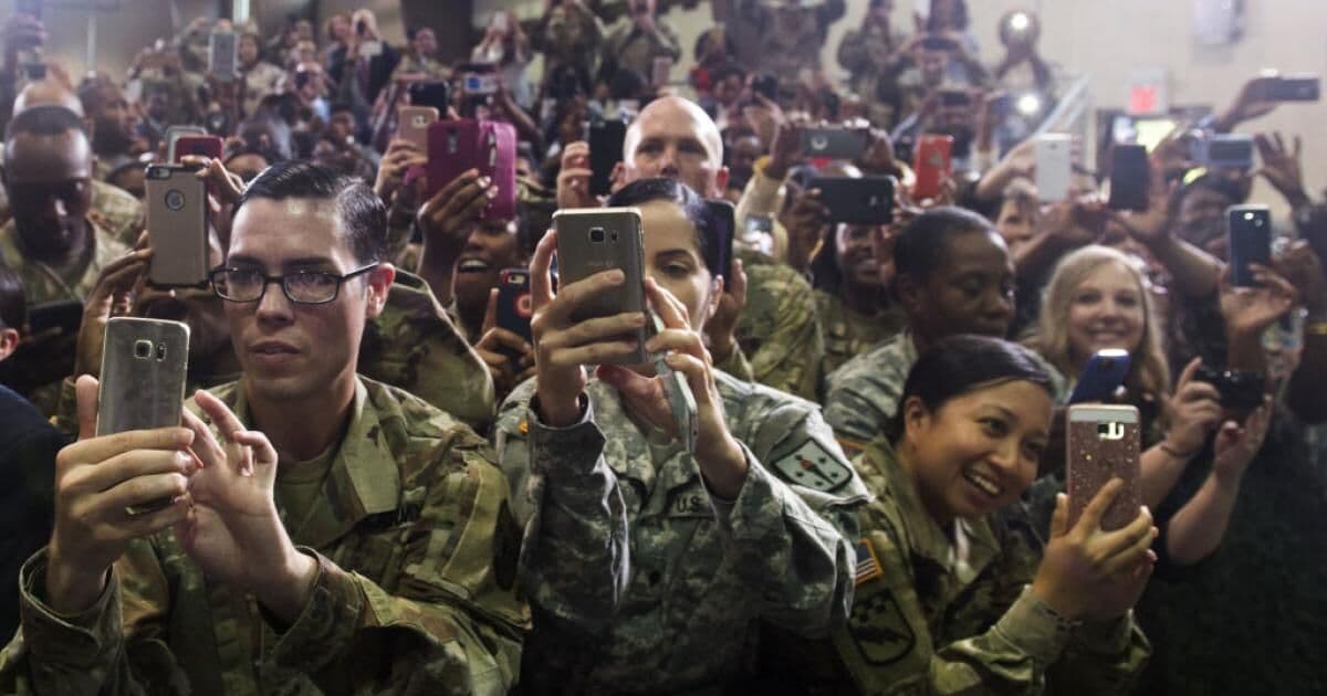 US warns on pocket spies, troops' phones confiscated