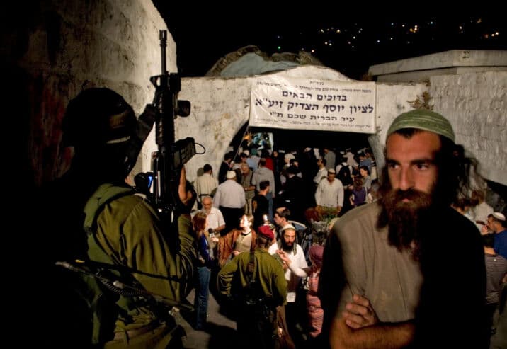 Settlers storm Joseph's Tomb in Nablus
