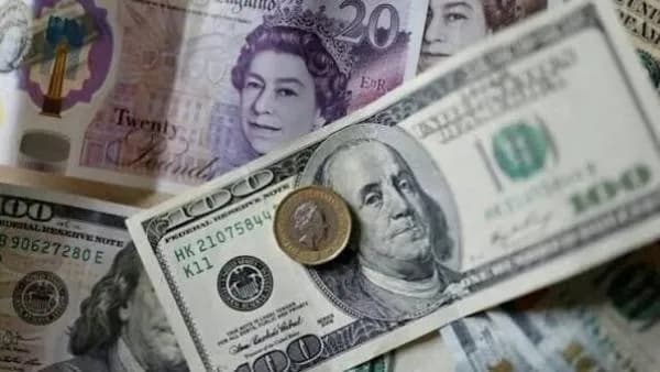 Pound Gains Against Dollar and Euro