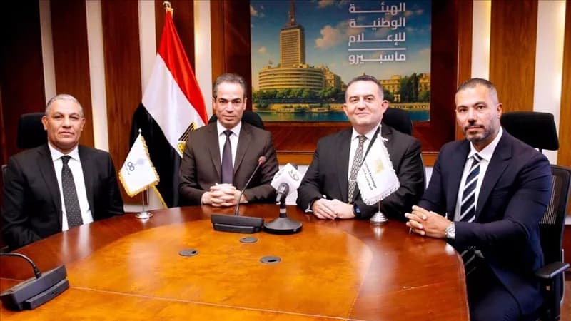 تعاون بين البورصة والوطنية للإعلام لتعزيز الثقافة المالية