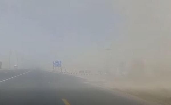 Dust reduces desert visibility and weather warns of hazards