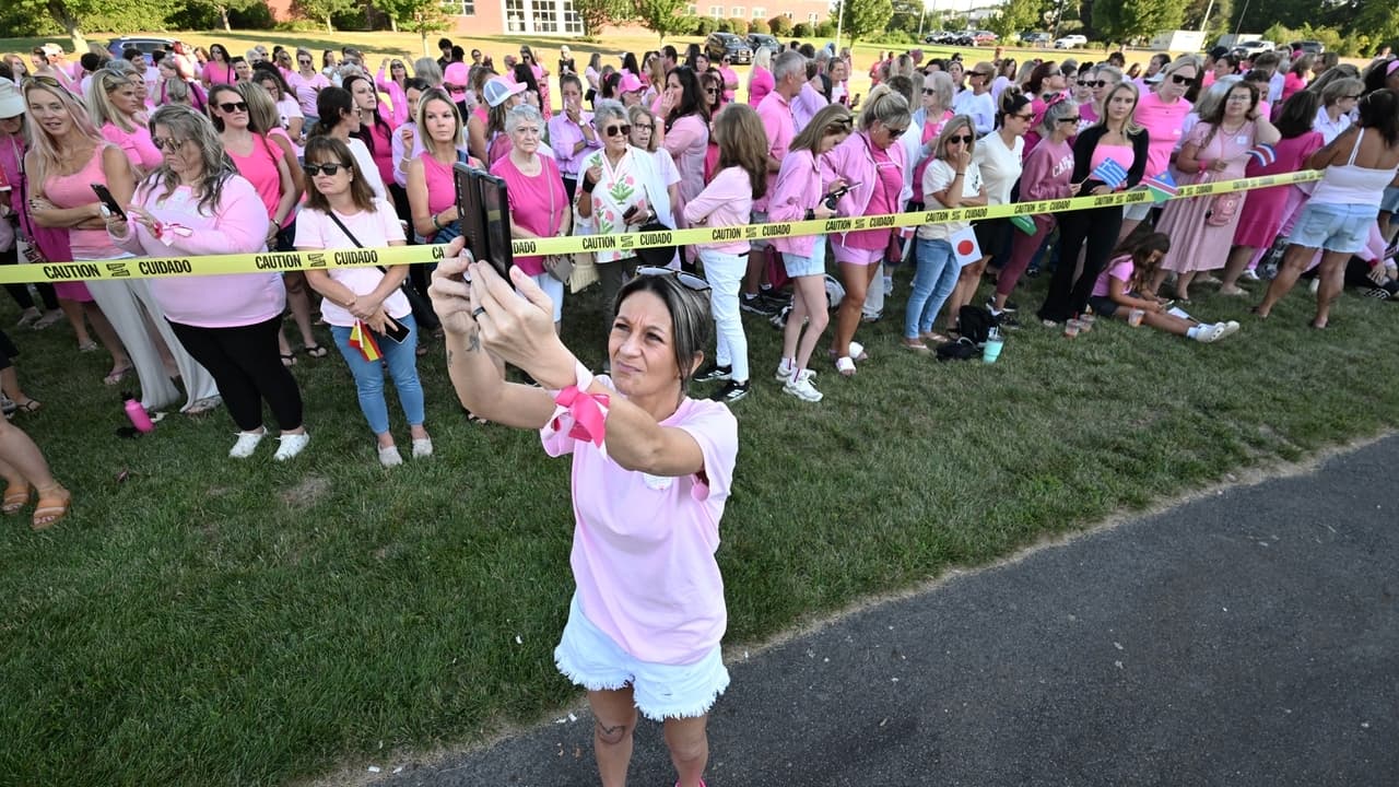 Women in pink support Lindsay Clancy