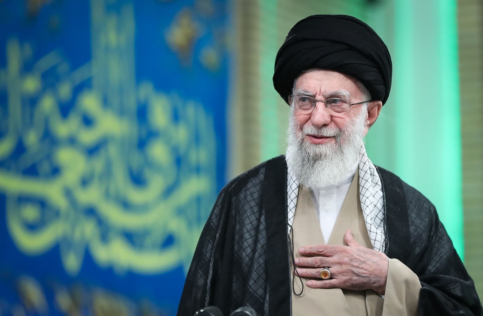 Rare photo of Ali Khamenei reading Quran
