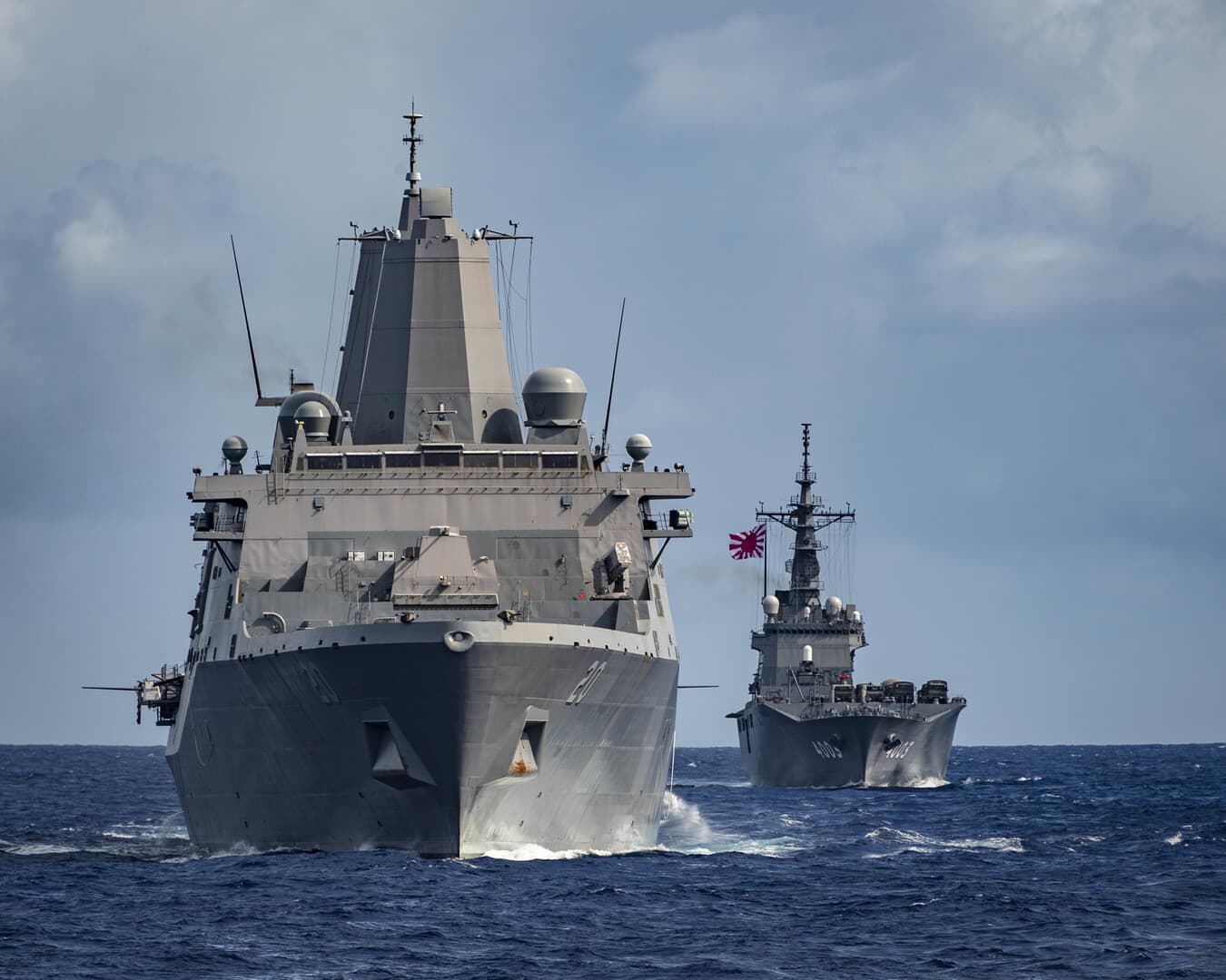 Tehran tests missile on destroyers near US ship