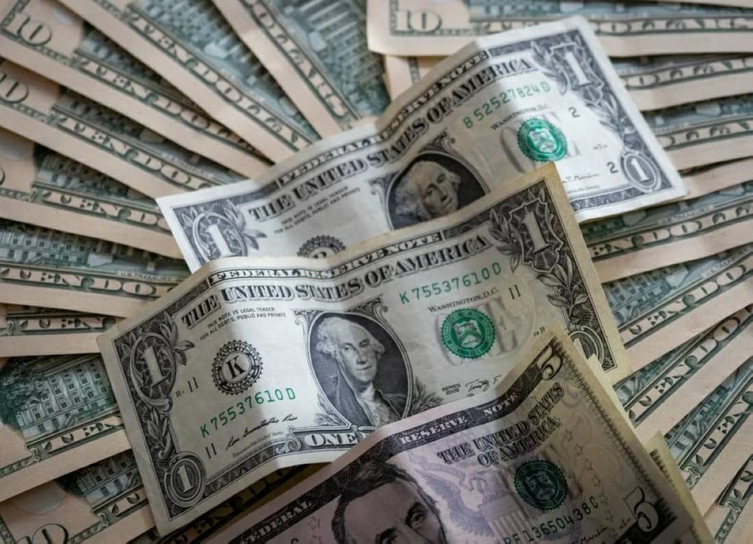 Dollar climbs ahead of inflation report