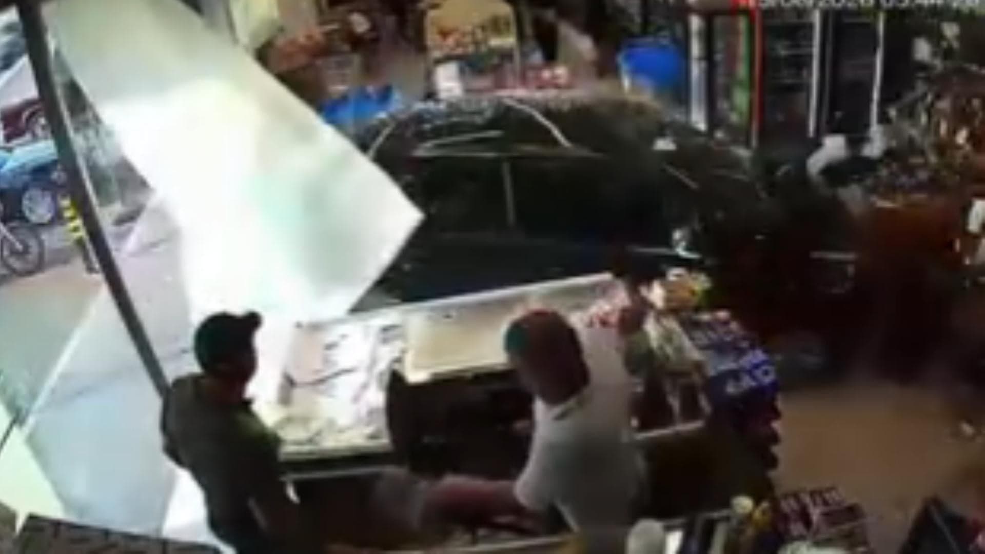 Car Collides with Supermarket
