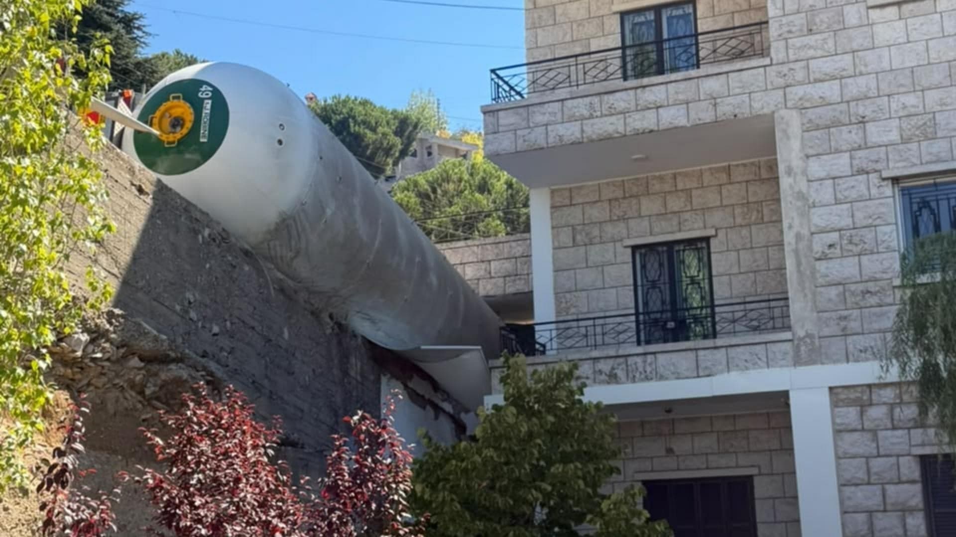 Gas tanker flips in Ain el-Tor