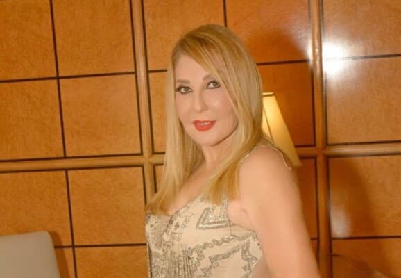 Nadia Al-Jundi comforts Naglaa Fathi