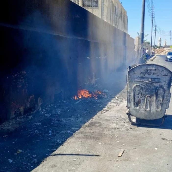 Repeated waste burning at Al-Qweisma School draws concern