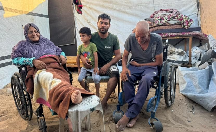 Fadi Shquora cares for disabled parents amidst war difficulties