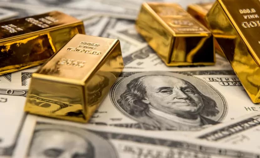 الدولار يتقدم قبل قرار الفائدة والذهب ينخفض