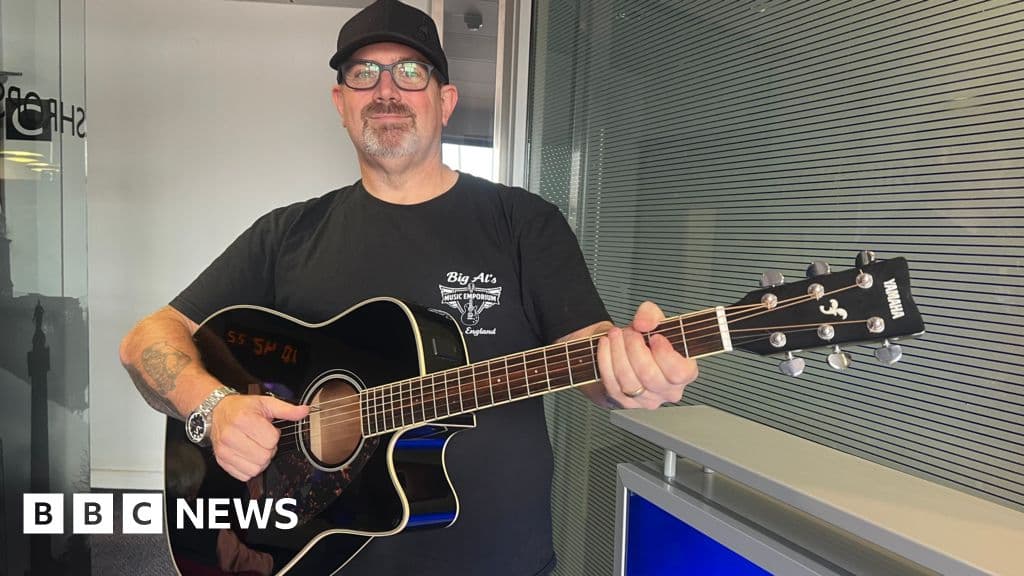 Shropshire shop owner donates guitars in Dolly's memory