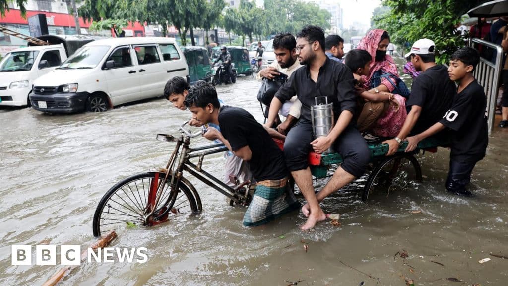 Heavy rain and flash floods in Bangladesh kill at least 50 people