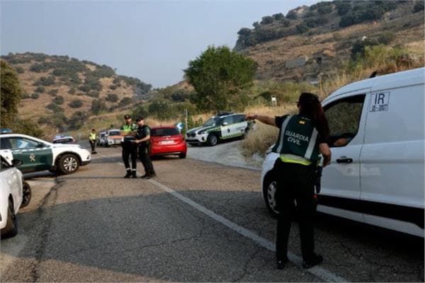 Evacuated residents near Madrid return