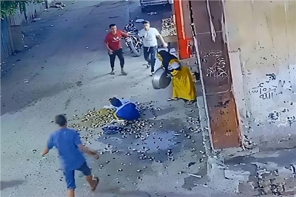 Minya woman strikes young man with basin