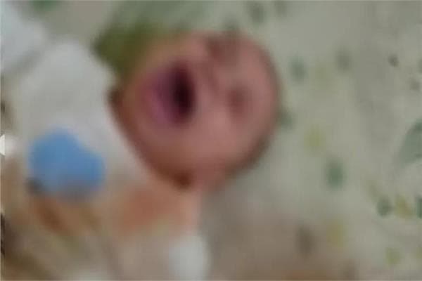 Security reviews footage of woman attacking her infant