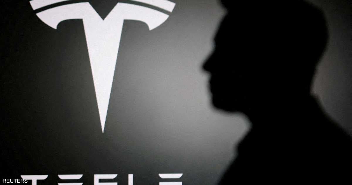 Tesla Q3 profits Halved