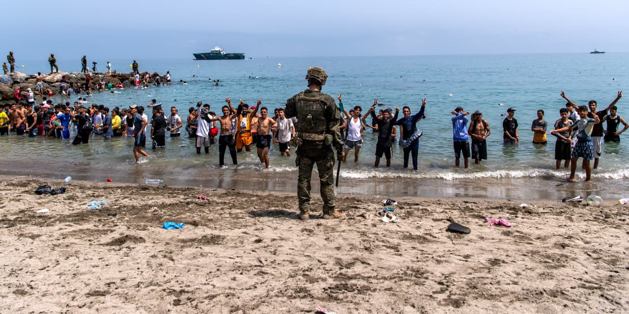 Spain restores control after migrant surge