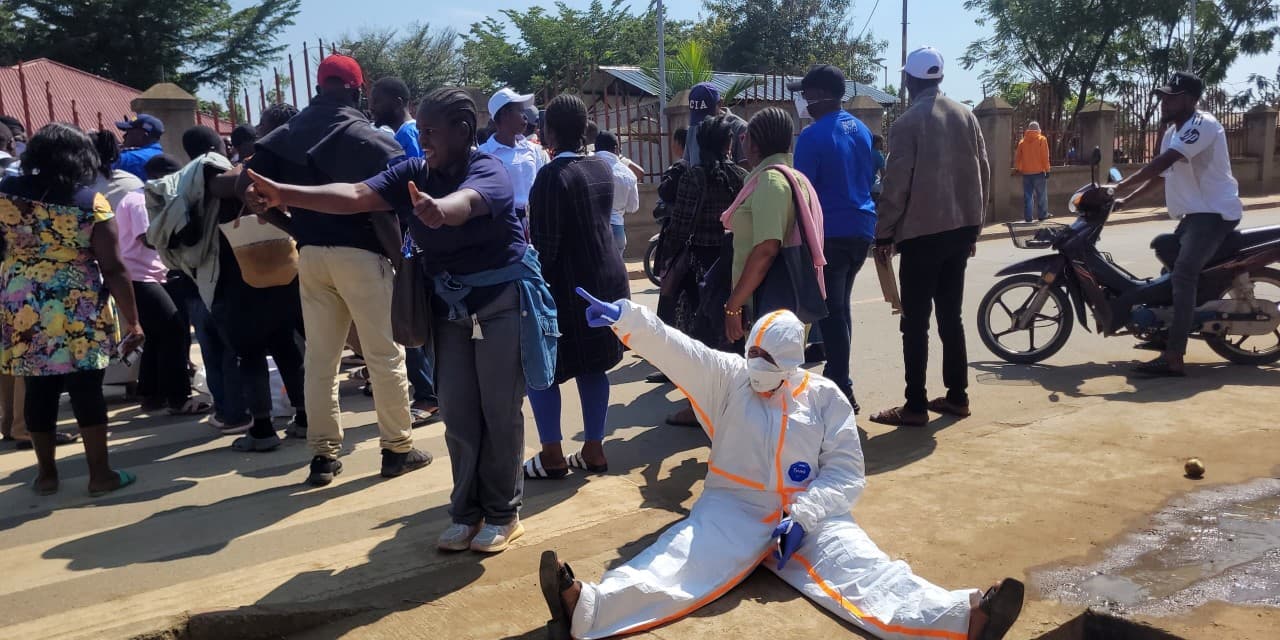 Ebola Workers Allow Family Contact with Deceased