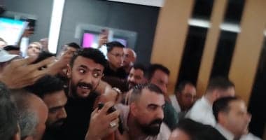 Fans surround artist Ahmed Al-Awady outside Alexandria cinemas