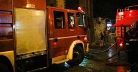 Civil defense cools battery shop fire site