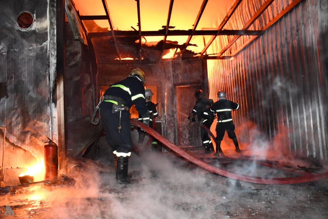 Baghdad wood storage fire contained