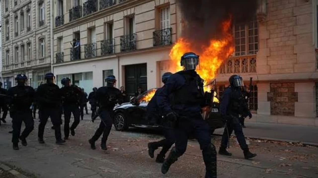 France enforces curfew after protests