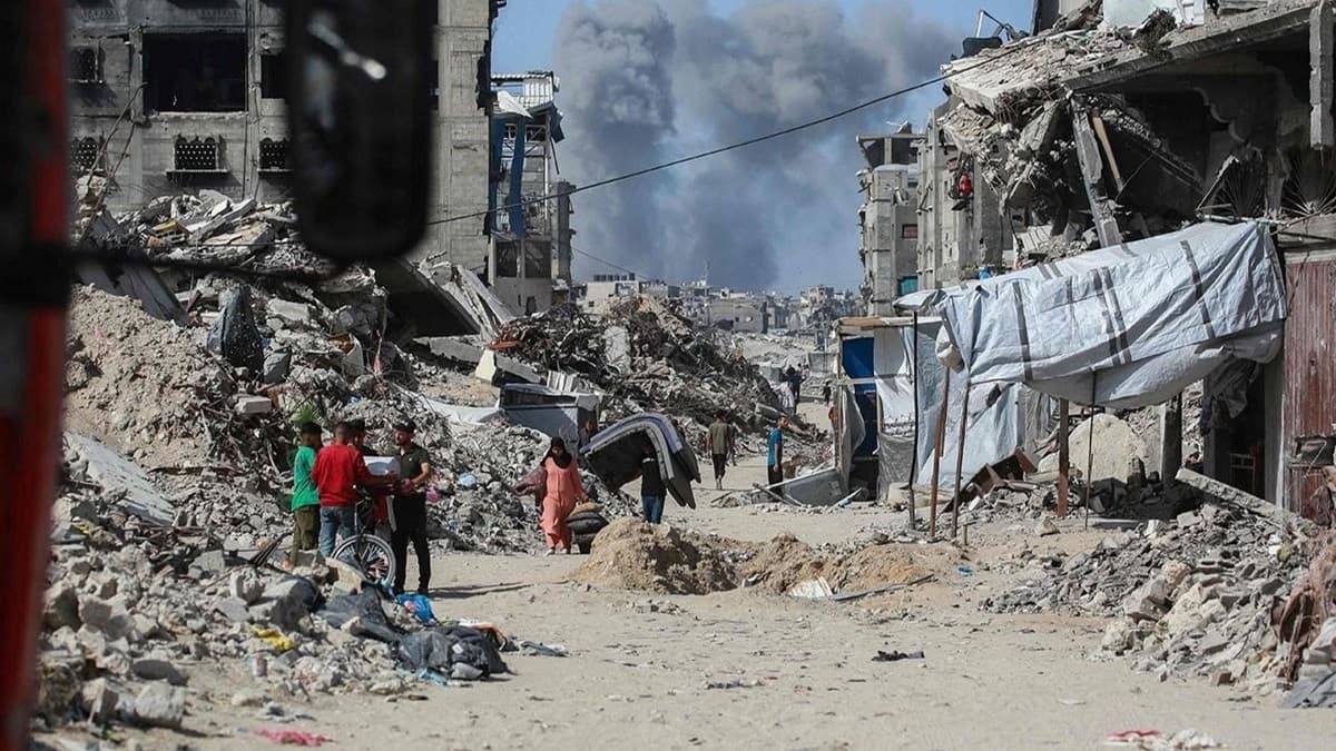 Three martyrs from Israeli shelling