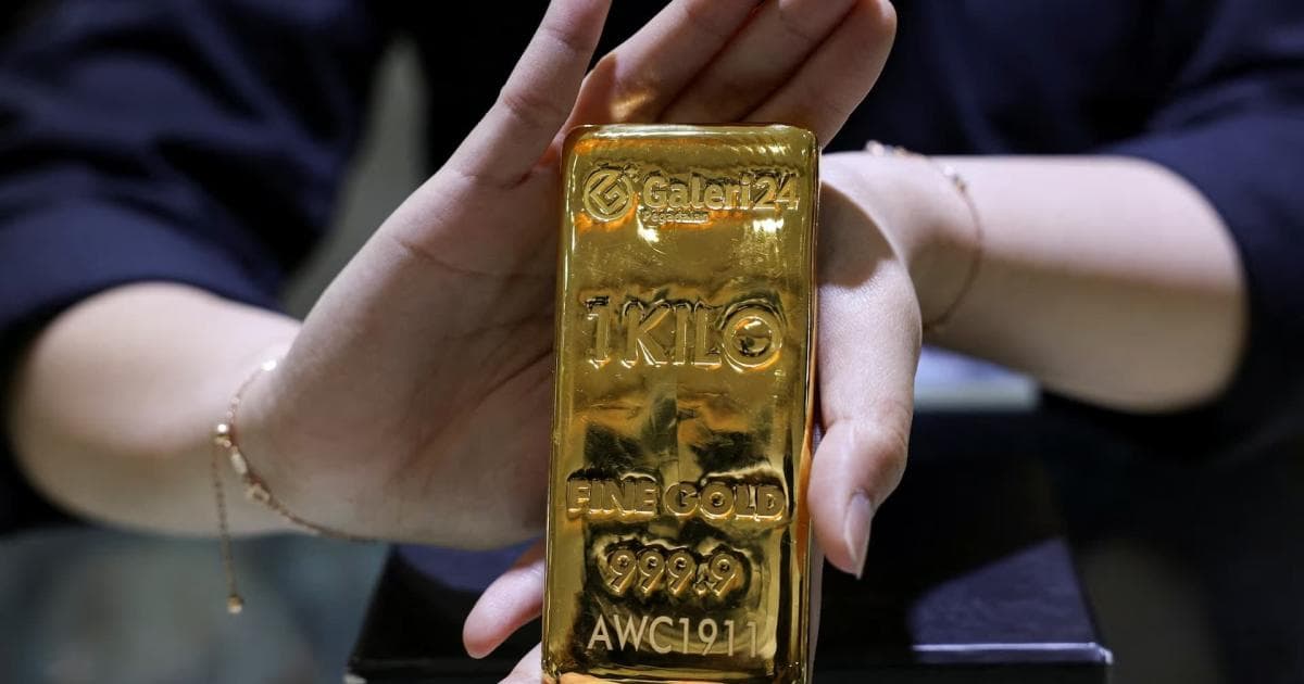 Gold holds steady after three-month high