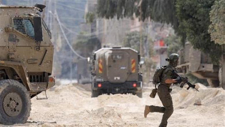 Israeli forces target shops in Jenin