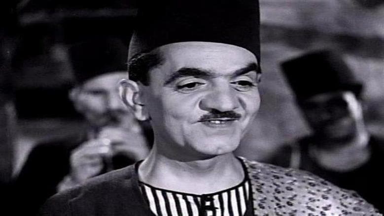 Mohamed Abdel Muttalib chases Sayyid Al-Mallah with a plank