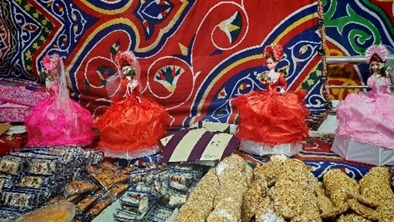 أسوان يدعم سوق حلوى المولد بإبداعات محلية