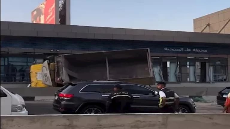 Truck overturns after bus station crash